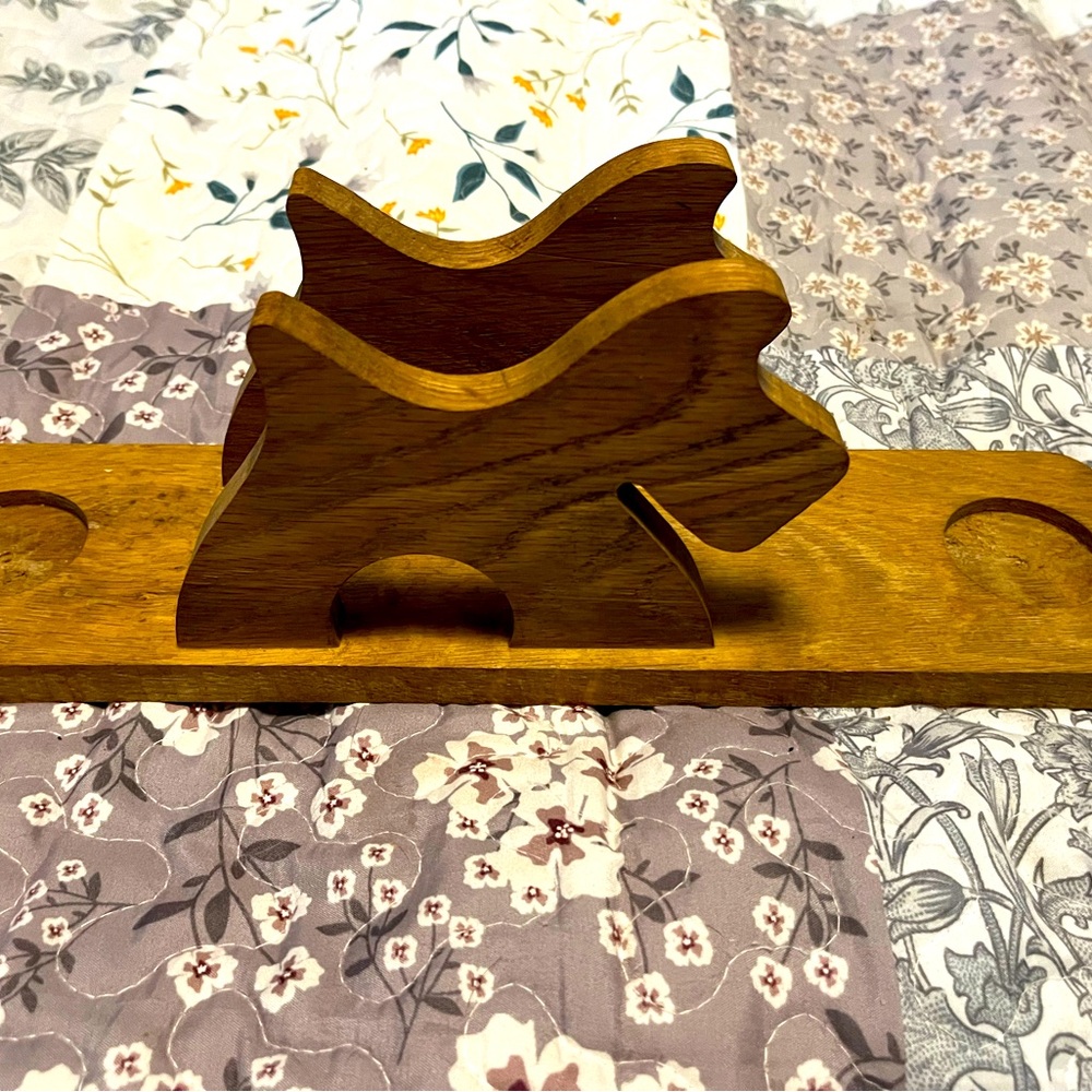 Wooden dog , table decor, holds salt and pepper shaker and napkins.